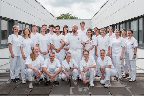 Gruppenfoto auf Terasse