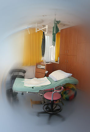 Kreiszimmer Bett